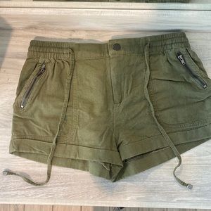 Low rise green shorts